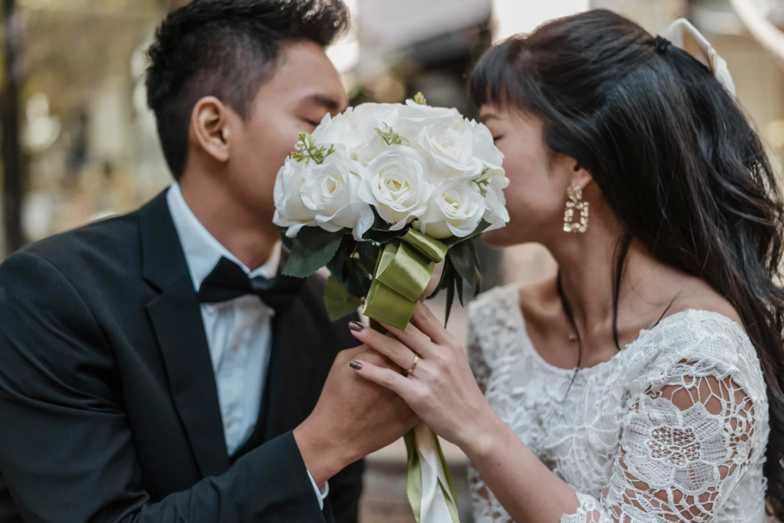 bride and groom posing for wedding pictures