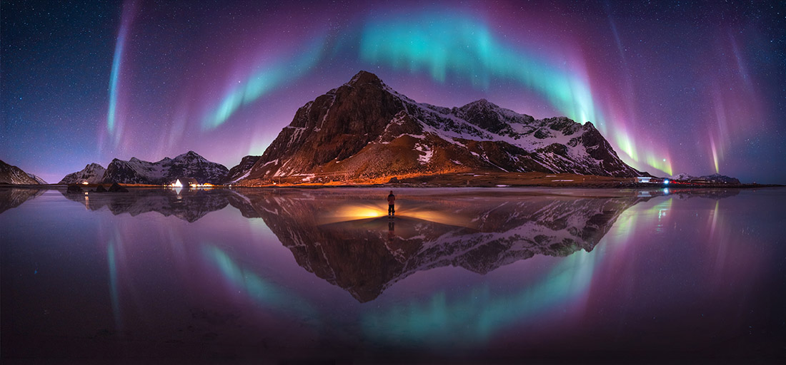 Aurora borealis arching over a mountain at Lofoten, Norway, the Southeast Asia Open winner at the Pano Awards 2026
